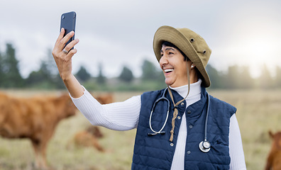 Image showing Video call, selfie and vet on a farm for consulting, communication and conversation about animals. Happy, speaking and cattle doctor looking for signal, talking on a mobile and working in agriculture