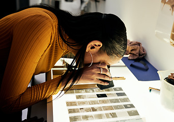 Image showing Woman, photographer and magnifying glass for film negatives, zoom and analysis for photo journalist job. Photography expert, analyse picture and focus in studio for choice, decision and creativity