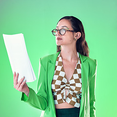 Image showing Fashion, paperwork and business woman isolated on green background for design career, gen z resume and internship. Young person or model with retro clothes and documents for job opportunity research