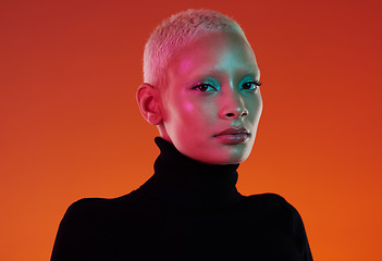 Image showing Face portrait, skincare and beauty of woman in studio isolated on a red background. Neon aesthetic, makeup cosmetics and young gen z model with glowing, healthy and flawless skin for futuristic girl
