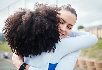 Image showing Hug, success or team support in netball training game or match in goals celebration on sports court. Teamwork, fitness friends group or excited athlete girls with happy smile or winning together