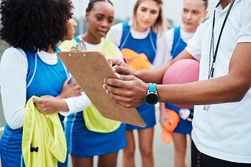 Image showing Clipboard hands, netball sports team and coach planning game plan, teamwork collaboration or explain competition idea. Coaching strategy, teaching and talking athlete listening to challenge plan
