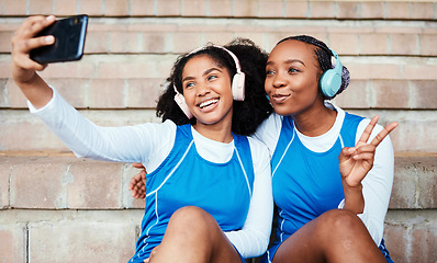 Image showing Selfie, netball and sports women or friends with headphones for training break, social media post and happy music. Athlete black people, teenager or gen z in profile picture and peace emoji hand