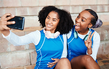 Image showing Netball selfie, sports women or team on break with social media post, happy training update and relax on floor. Athlete black people, teenager or gen z friends in profile picture and peace emoji hand