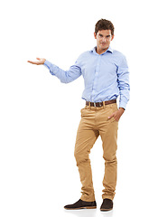 Image showing Portrait, isolated and man presenting space for product placement for marketing or advertising. Mockup, hand gesture and happy model showing info for deal in studio on white background.