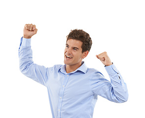 Image showing Winner, yes and man isolated on a white background for winning, success and bonus arms or fist pump. Celebration, goal achievement and happy business person or excited model celebrate win in studio