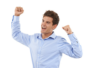 Image showing Winner, cheer and business man isolated on a white background winning, success and bonus, yes or fist pump. Celebration, goal achievement of professional, person or excited model celebrate in studio