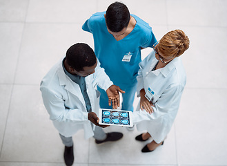 Image showing Doctor, tablet and meeting in healthcare above on screen for research, anatomy or surgery analysis. Medical professional team holding touchscreen and brain x ray display in collaboration or planning