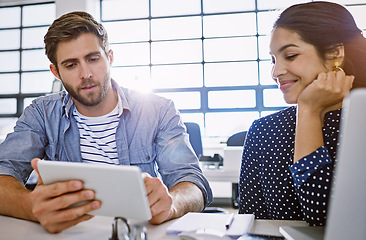 Image showing Conversation, tablet and opinion, man and woman in office sharing ideas and meeting for creative project. Teamwork, planning proposal and employees in discussion at tech startup or design agency.