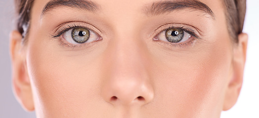 Image showing Portrait, eyes and woman in studio for makeup, beauty and skincare treatment closeup. Face, zoom and microblading or mascara for girl model with luxury lash, cosmetic or skin cosmetology satisfaction