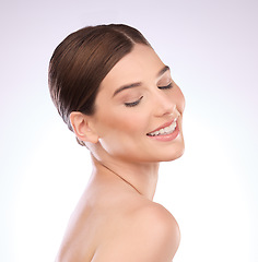 Image showing Woman, beauty and face of skincare, smile and laser transformation on studio background. Happy model, facial aesthetic and wellness for salon cosmetics, healthy shine and clean dermatology results