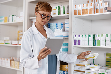 Image showing Tablet, pharmacy woman and medicine shelf to check inventory and product information search. Pharmacist person Pharma app in clinic or shop for pharmaceutical, medical and health care consultation