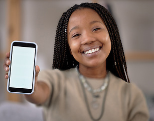 Image showing Portrait, phone screen and mockup smile with black woman in home for marketing, advertising or promotion. Face branding, hands and happy female with smartphone for copy space or product placement.