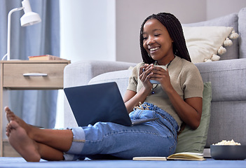 Image showing Relax, black woman on floor and laptop for break, streaming movies, happiness and rest. African American female, girl and device in lounge, online reading or search website for funny videos on ground