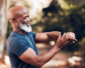 Image showing Smart watch, senior man and fitness with exercise and mockup screen to check time performance. Hands of black person with smartwatch health app for heart, steps and clock or workout progress outdoor