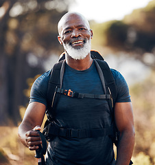 Image showing Fitness, hiking and portrait of black man in forest for freedom, health and sports training. Exercise, peace and wellness with senior hiker trekking in nature for travel, summer break and adventure