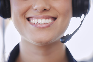 Image showing Closeup, smile and woman with headset, call center or worker with communication, contact us or customer service. Zoom, female agent or consultant with tech support, mouth or telemarketing with advice