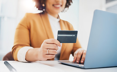 Image showing Hands, computer and office with credit card for black woman, e-commerce or online shopping with cybersecurity. Corporate executive, laptop and ecommerce for discount, sale and fintech at workplace