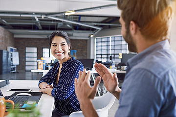 Image showing Meeting, smile and business man and woman in office talking, laughing and in funny conversation at desk. Communication, teamwork and happy workers in discussion, chatting and brainstorming ideas