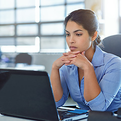 Image showing Business woman with laptop, thinking and reading with research, email marketing and SEO with ideas. Technology, connectivity with focus and serious female at desk, professional workspace and strategy