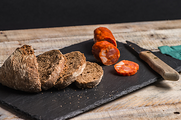 Image showing Malt loaf bread and chorizo slices