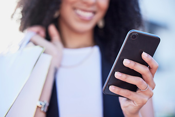 Image showing City, shopping and black woman with phone for app, web and internet search, happy and excited for sale. Smartphone, hand and girl with bags outdoors at a mall, texting or browsing for online discount