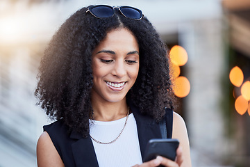 Image showing Young black woman, phone and texting in city with smile, online date and social media app for contact. Happy gen z girl, smartphone and internet communication with digital ux, chat and walk in street