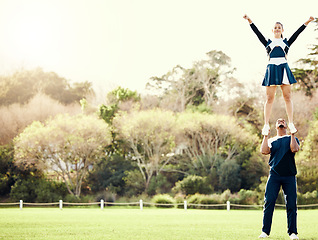 Image showing Cheerleading student, lift and mockup outdoor for on cheer camp with exercise and fitness. Students, air pose and strong male athlete doing training and workout with cardio and mock up in nature