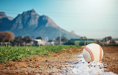 Image showing Sports mockup, baseball and ball on ground ready for game, practice and competition outdoors. Fitness, sport copy space and softball equipment on field for exercise, training and workout for match