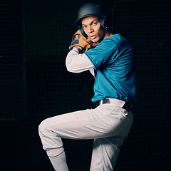 Image showing Baseball pitcher, black man and studio portrait with focus, vision and balance for sport, game and motivation. Sports, exercise and training with goals, contest or competition by dark background