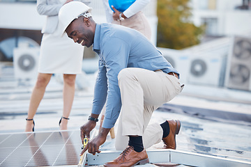 Image showing Black man, engineer and solar panel grid installation of construction worker technician outdoor. Businessman, renewable energy and industrial eco friendly panels of maintenance employee and handyman