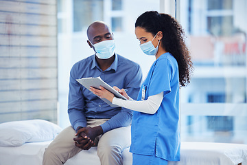 Image showing Doctor consultation, mask and patient results of a nurse with a black man in a hospital. Clinic, covid conversation and nursing communication with medical data and healthcare discussion for advice