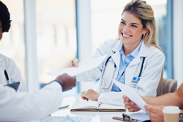 Image showing Healthcare, doctors and woman with smile, documents and meeting for planning, admin and conversation. Medical professional, female employee and coworkers with forms, feedback and reports in hospital