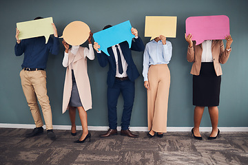 Image showing Business people, speech bubbles and communication in workplace, logo and feedback against grey wall. Group, staff and teamwork for advertise campaign, opinion and announcement with banner or creative