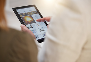 Image showing Tablet, news and article with a business team reading headlines together in their office at work. Media, internet or research with a man and woman employee searching for information online