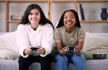 Image showing Friends, women on sofa and video games for quality time, relax or happiness on break, competitive or multiplayer app. Female gamers, ladies or controllers for esports, fun or entertainment with smile