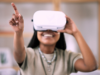 Image showing Black woman, pointing and virtual reality glasses for metaverse, smile and games in living room. Vr, Nigerian female and girl in lounge, futuristic and simulation with technology for fun and playful