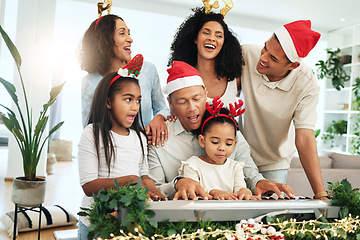 Image showing Love, Christmas and family singing, quality time and happiness with bonding, loving and smile. Grandparents, happy mother and father with children, Xmas and festive season with decorations and carols