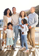 Image showing Love, happy and portrait of a big family outdoor on the balcony of their modern house. Happiness, smile and girl children siblings standing with their parents and grandparents outside of the home.