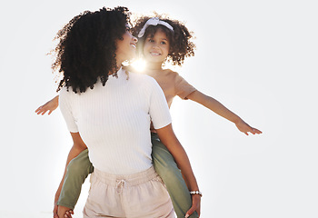 Image showing Piggy back, mother and girl outdoor, love and happiness with quality time, playful and cheerful. Lens flare, family and mama carry daughter, smile and joyful on weekend break, fun or carefree outside