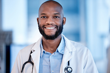 Image showing Portrait of black man doctor in healthcare career, professional service smile and hospital job mindset. Face or headshot of young medical person or cardiologist with leadership and happy opportunity