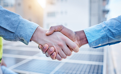 Image showing Handshake, engineering and teamwork with people and solar panels for partnership, renewable energy or deal. Agreement, sustainability and thank you with engineer shaking hands for eco, b2b or welcome