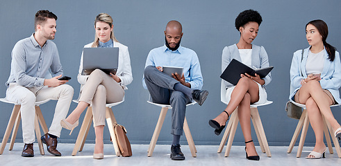 Image showing Technology, recruitment and a group of business people waiting in line for their meeting with human resources. Interview, hiring or diversity with man and woman candidates sitting in a row at hr