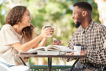 Image showing Black couple, coffee and happy outdoor on a date while studying, talking and bonding at table. Man and woman students with a drink or tea to relax, study and talk about love and care at cafe or shop