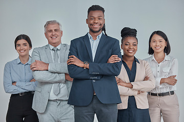 Image showing Leadership, team and business people with crossed arms in a studio with confidence, unity and teamwork. Collaboration, corporate and portrait of a group of employees standing by a gray background.