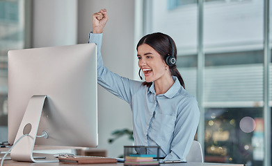 Image showing Business woman, call center and celebration for winning, promotion or sale in telemarketing at office desk. Happy female consultant or agent celebrating victory, good news or success at the workplace