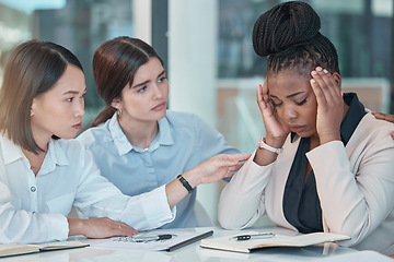 Image showing Headache, stress and support with a business black woman suffering from burnout while colleagues console her. Anxiety, mental health and depression with a female employee group comforting a coworker