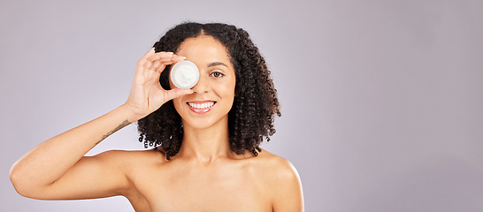 Image showing Skincare, face and black woman with cream container in studio isolated on a gray background mockup. Dermatology portrait, cosmetics and happy female with lotion, creme or moisturizer for skin health.