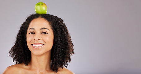 Image showing Apple, green fruit and portrait of a black woman holding wellness food for detox and weight loss. Skincare, beauty and young model in a isolated studio for nutrition and vitamin diet with mockup