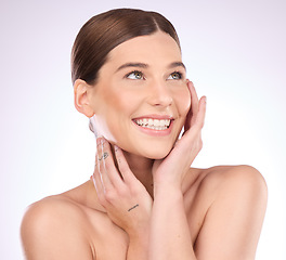 Image showing Skincare, happy and hands on face of woman in studio for grooming, cosmetics and wellness on gradient background. Beauty, smile and girl model relax in luxury, makeup and skin dermatology routine